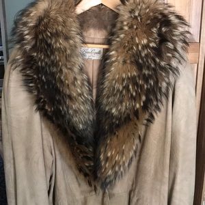 A suede & fur jacket.  Size LARGE.